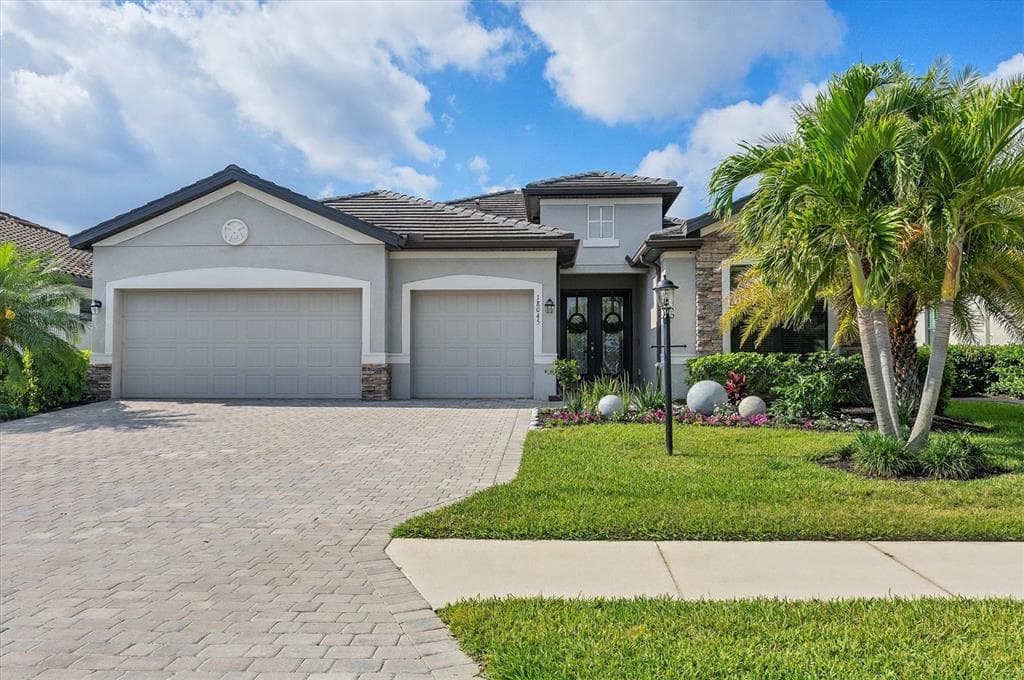 18045 POLO TRAIL STREET - 3bd/3ba - $865,000 - LAKEWOOD RANCH, FL
