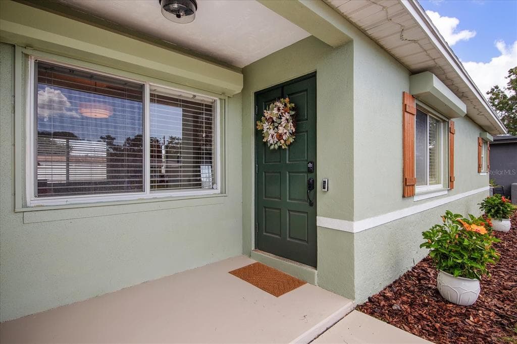 5851 44TH AVENUE N - Interior/Exterior Photo 4 - KENNETH CITY, FL