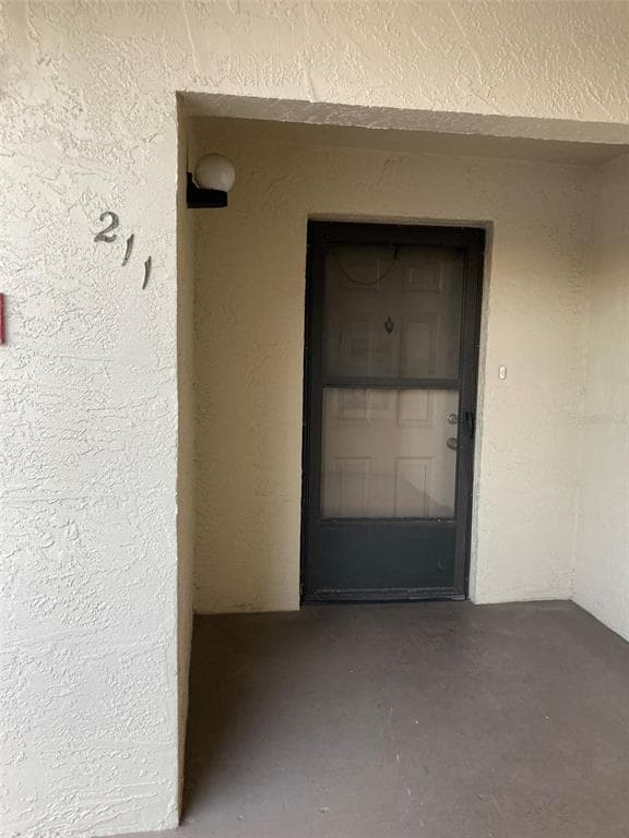 8198 TERRACE GARDEN DRIVE N UNIT 211 - Interior/Exterior Photo 2 - ST PETERSBURG, FL