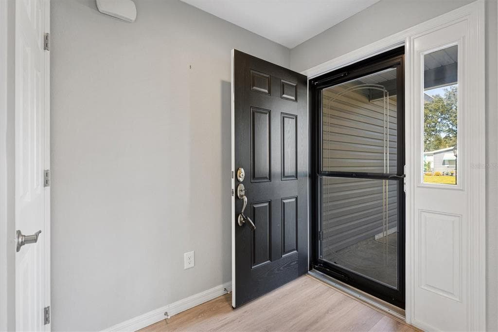 706 JASON DRIVE - Interior/Exterior Photo 3 - LADY LAKE, FL