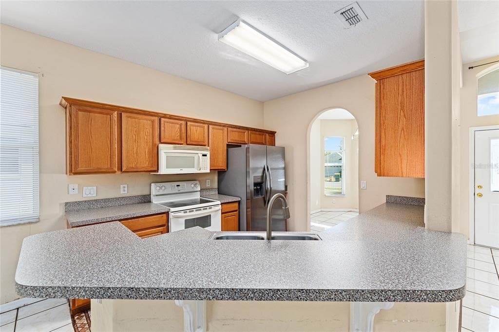 1621 MOUNTCLAIR COURT - Interior/Exterior Photo 5 - MOUNT DORA, FL