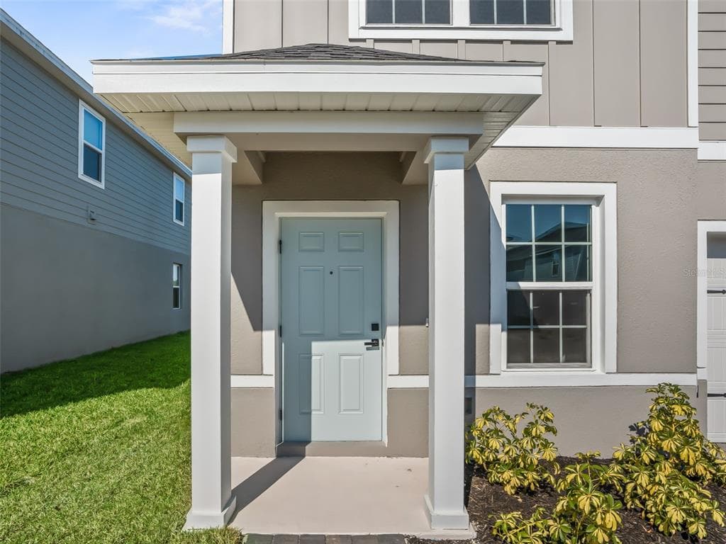 1205 PORT BLUE WAY - Interior/Exterior Photo 5 - LADY LAKE, FL