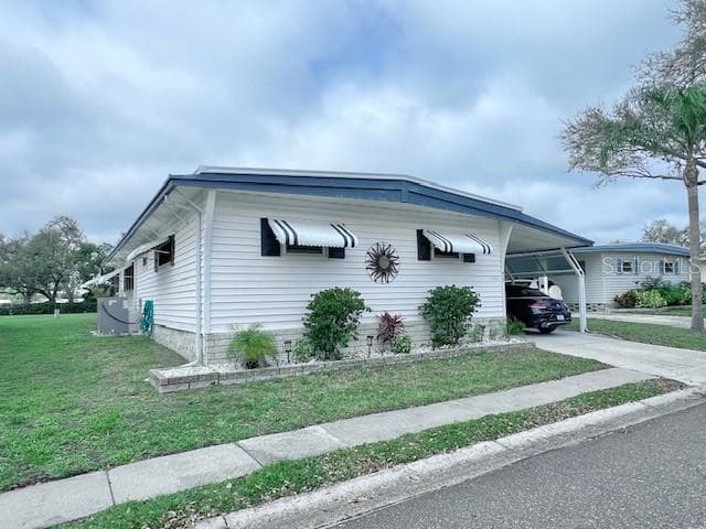 1100 BELCHER ROAD S UNIT 473 - Interior/Exterior Photo 4 - LARGO, FL