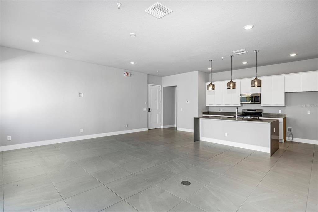 7770 SANDY RIDGE DRIVE UNIT 129 - Interior/Exterior Photo 4 - REUNION, FL