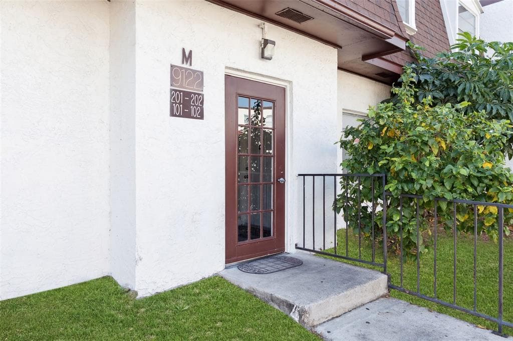 9122 TUDOR DRIVE UNIT M102 - Interior/Exterior Photo 3 - TAMPA, FL