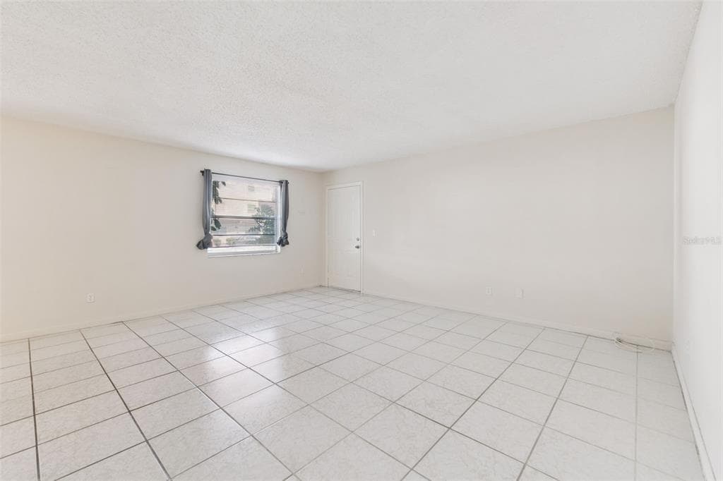 9122 TUDOR DRIVE UNIT M102 - Interior/Exterior Photo 5 - TAMPA, FL