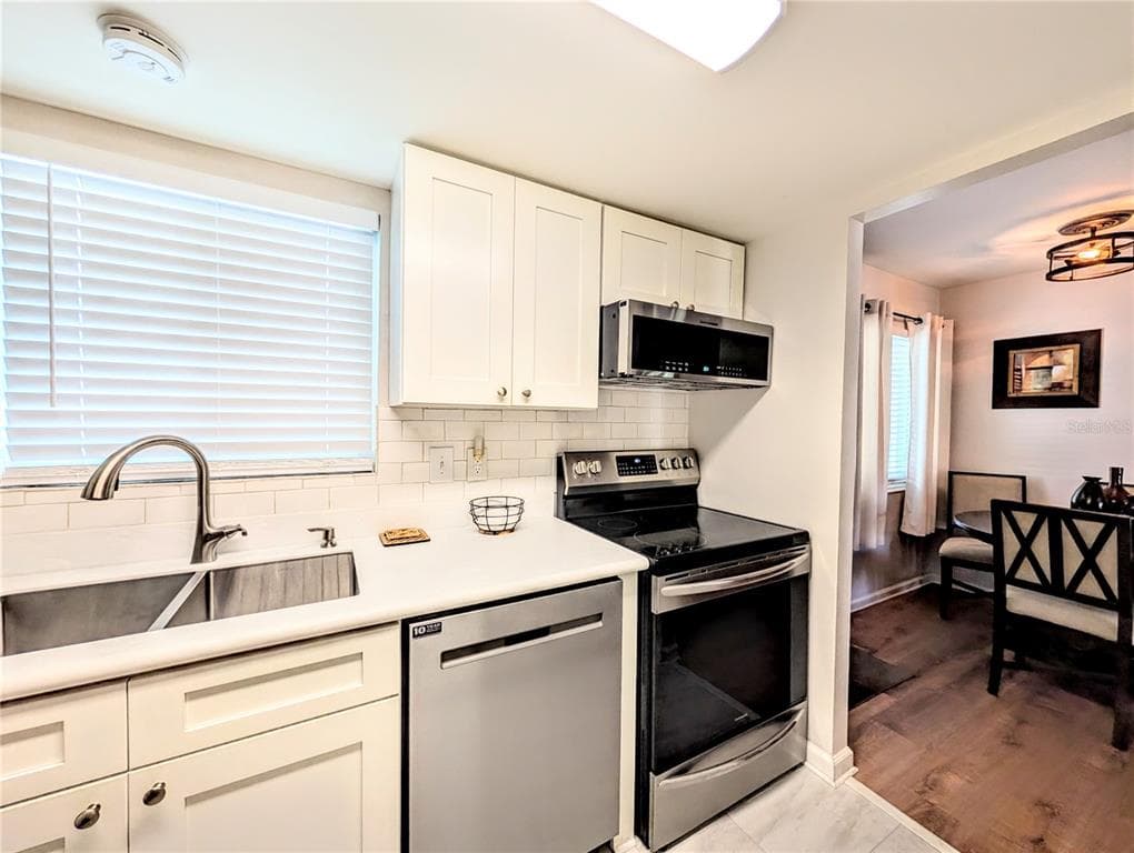 1581 LEISURE DRIVE UNIT M7 - Interior/Exterior Photo 2 - BRADENTON, FL