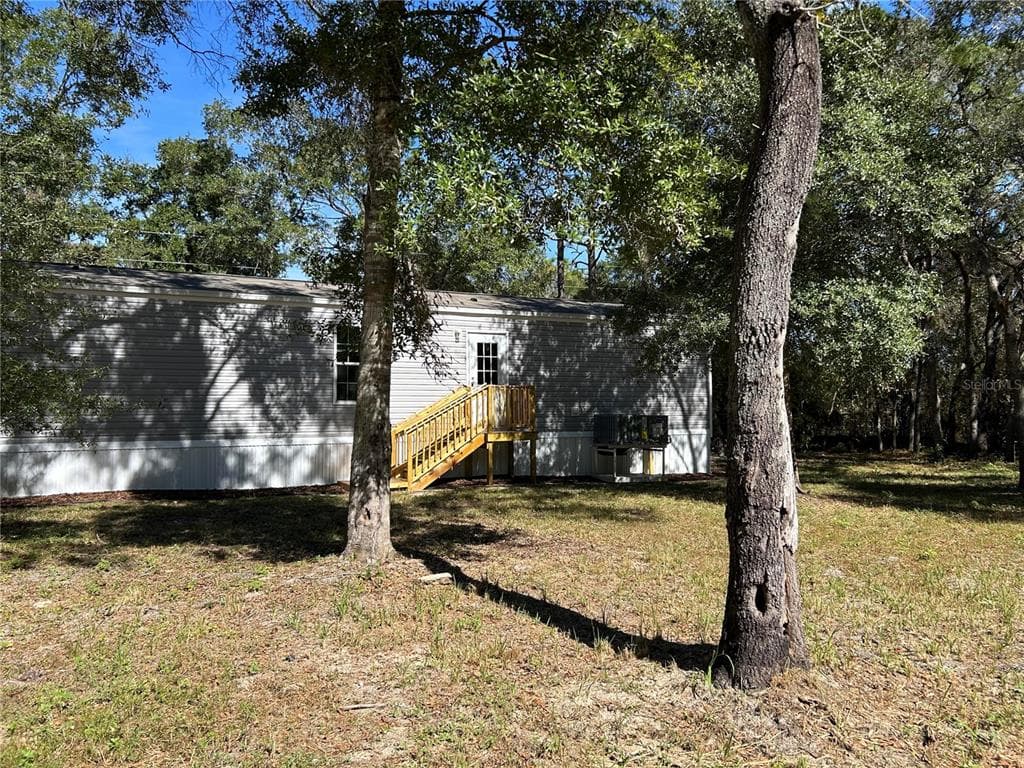 16464 AUBURNDALE - Interior/Exterior Photo 4 - SHADY HILLS, FL