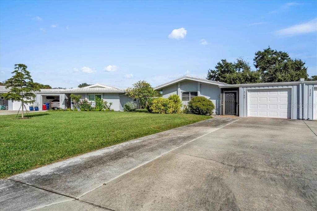 3140 VILLAGE GREEN DRIVE UNIT 1119 - Interior/Exterior Photo 2 - SARASOTA, FL