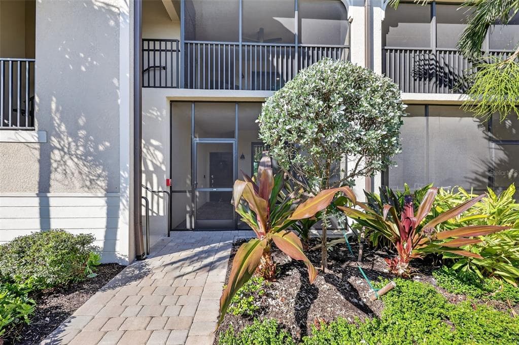 5720 PALMER CIRCLE UNIT 102 - Interior/Exterior Photo 5 - BRADENTON, FL