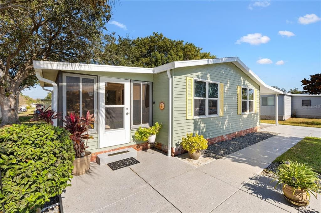 713 SHARON DRIVE - Interior/Exterior Photo 2 - LADY LAKE, FL