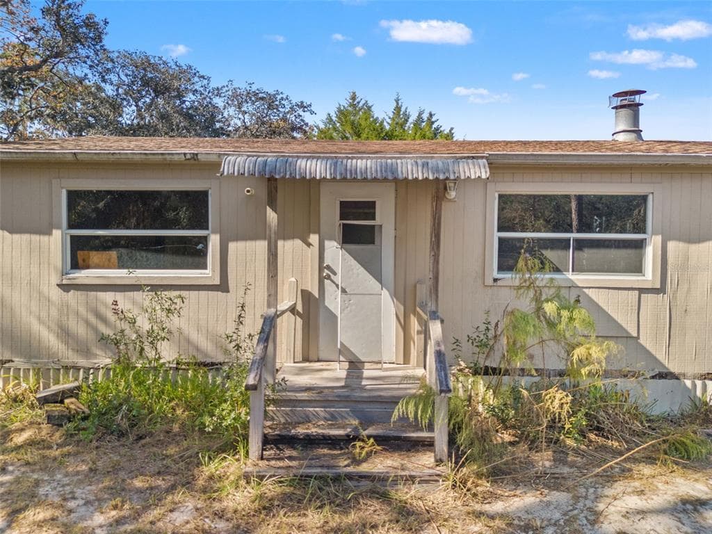 18409 RIGSBY ROAD - Interior/Exterior Photo 2 - SPRING HILL, FL