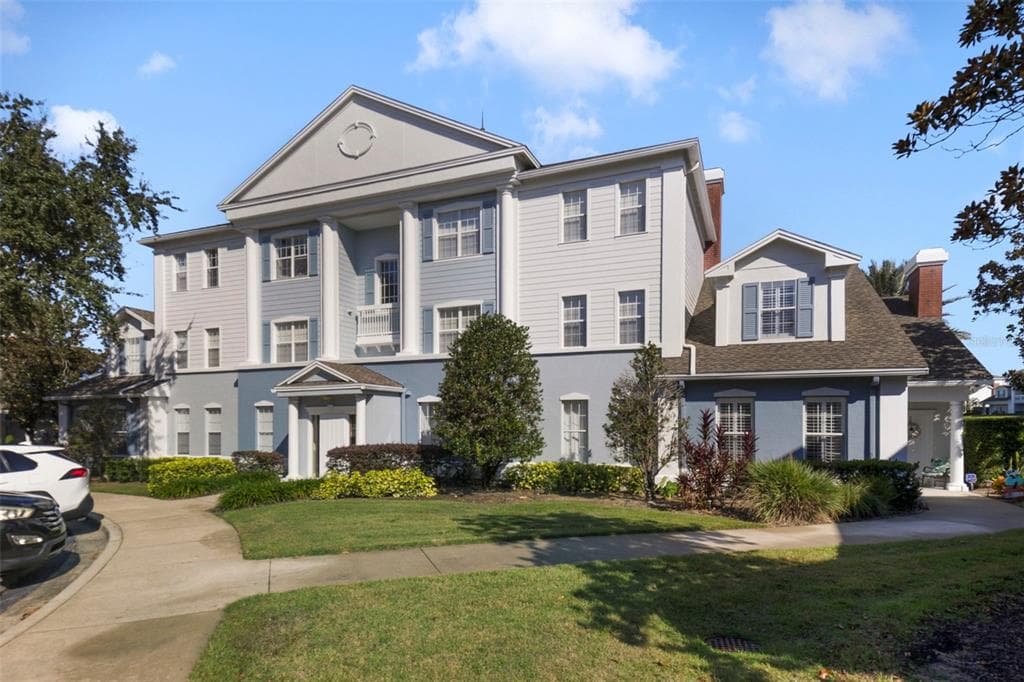 1591 HERITAGE CROSSING COURT UNIT 101 - Interior/Exterior Photo 2 - REUNION, FL