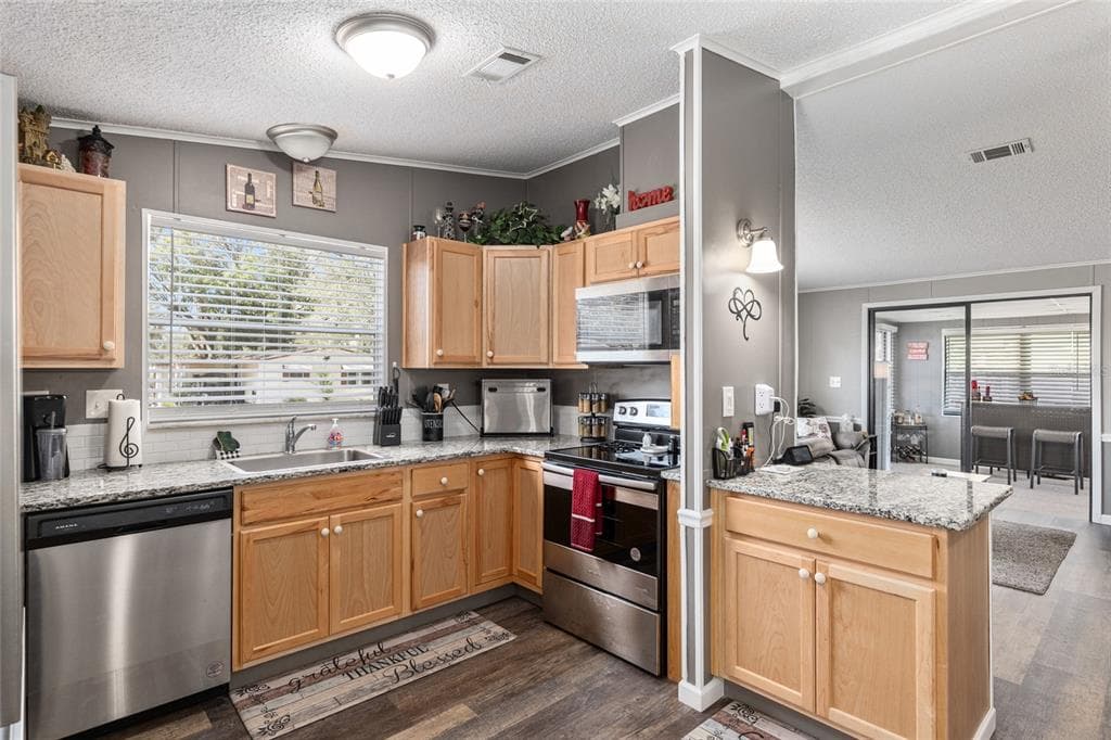 1727 HILTON HEAD BOULEVARD - Interior/Exterior Photo 5 - LADY LAKE, FL