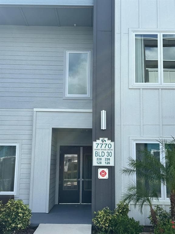 7770 SANDY RIDGE DRIVE UNIT 126 - Interior/Exterior Photo 2 - REUNION, FL