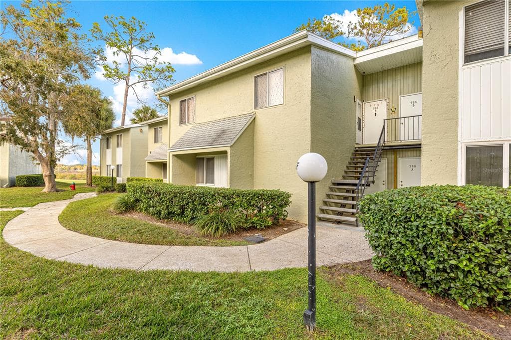 586 FAIRWAYS CIRCLE UNIT A - Interior/Exterior Photo 2 - OCALA, FL
