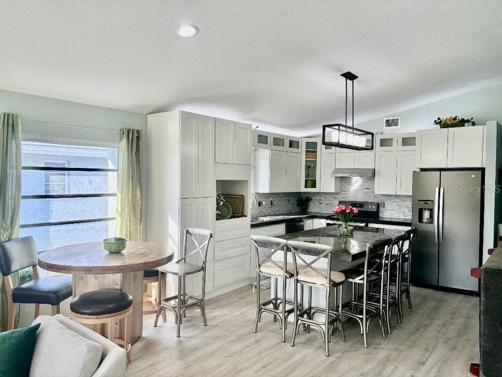 1041 CAPRI ISLES BOULEVARD UNIT 219 - Interior/Exterior Photo 2 - VENICE, FL