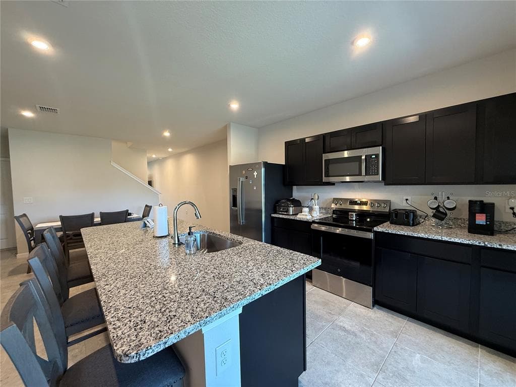 1204 PORT BLUE WAY - Interior/Exterior Photo 3 - LADY LAKE, FL