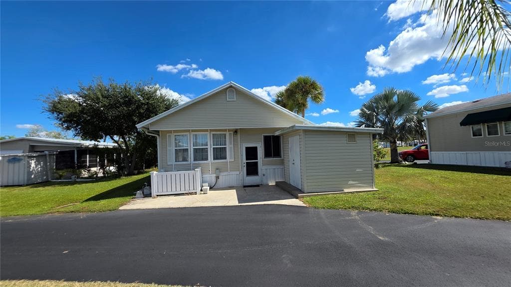 1674 UNIVERSITY PKWY LOT 159 - Interior/Exterior Photo 3 - SARASOTA, FL