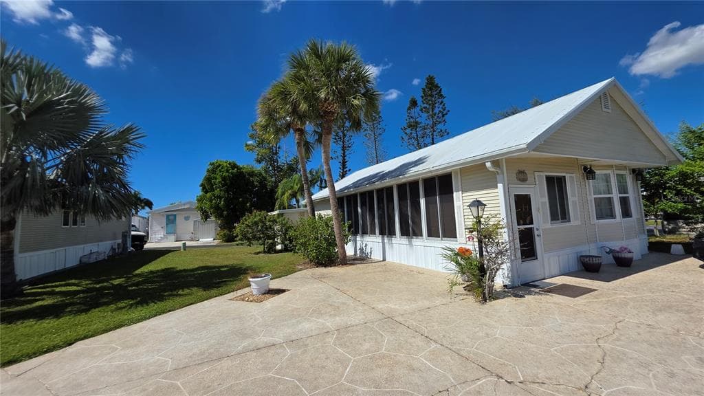 1674 UNIVERSITY PKWY LOT 159 - Interior/Exterior Photo 5 - SARASOTA, FL