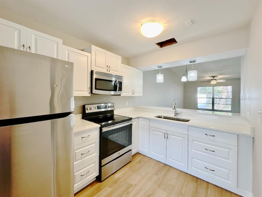 7135 PARKSIDE VILLAS DRIVE N - Interior/Exterior Photo 3 - ST PETERSBURG, FL