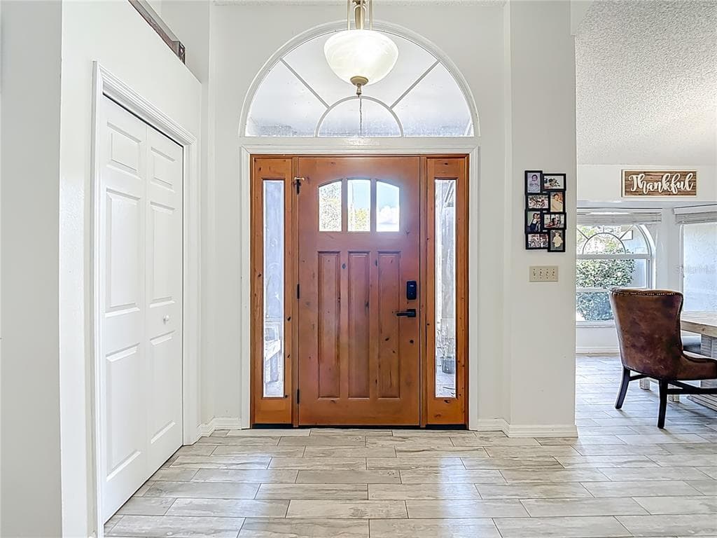 1621 SIR HENRYS TRAIL - Interior/Exterior Photo 5 - LAKELAND, FL