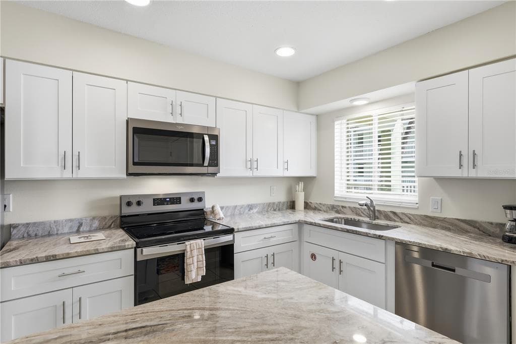 7100 GULF DRIVE UNIT 106 - Interior/Exterior Photo 4 - HOLMES BEACH, FL