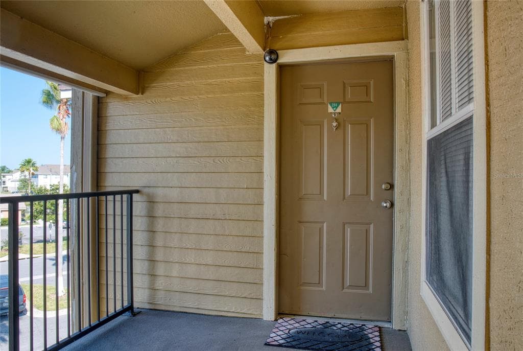 4105 TROPICAL ISLE BOULEVARD UNIT 231 - Interior/Exterior Photo 3 - KISSIMMEE, FL