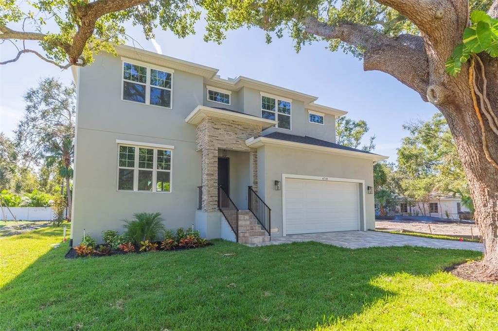 4718 W KNIGHTS AVENUE - Interior/Exterior Photo 2 - TAMPA, FL