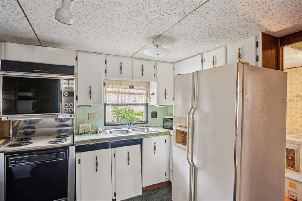 9310 KIOWA DR - Interior/Exterior Photo 2 - NEW PORT RICHEY, FL