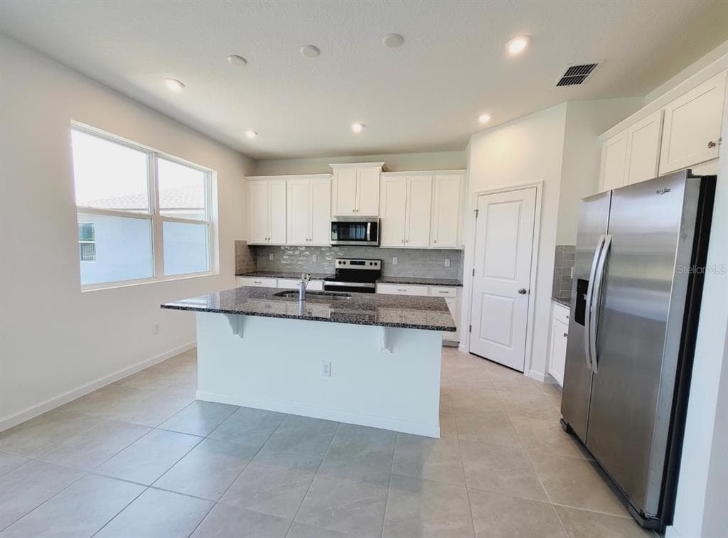 9051 CORAL CAPE STREET - Interior/Exterior Photo 3 - KISSIMMEE, FL